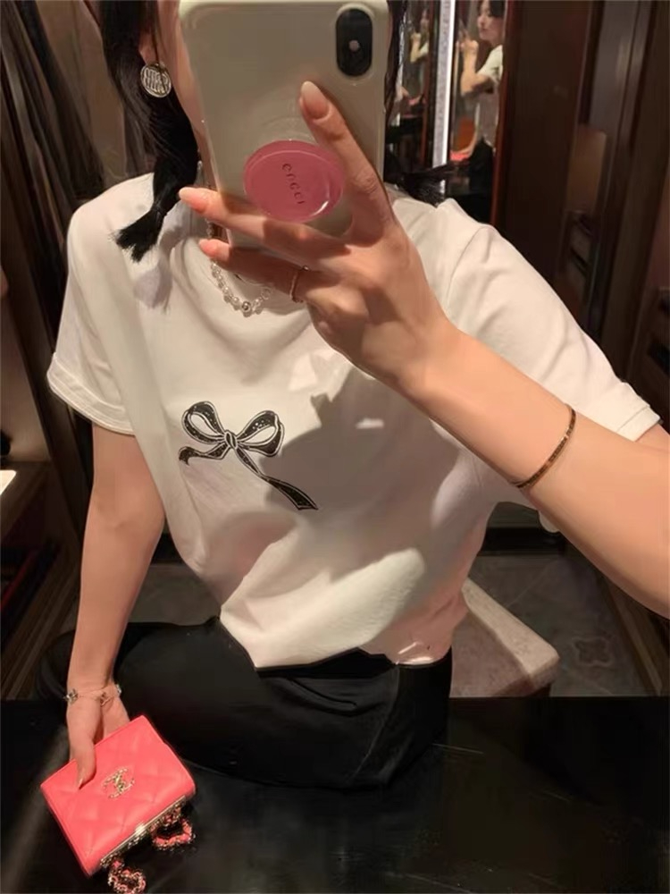 American retro white bow top women's summer design niche loose chic sweet spicy short sleeves right shoulder t...