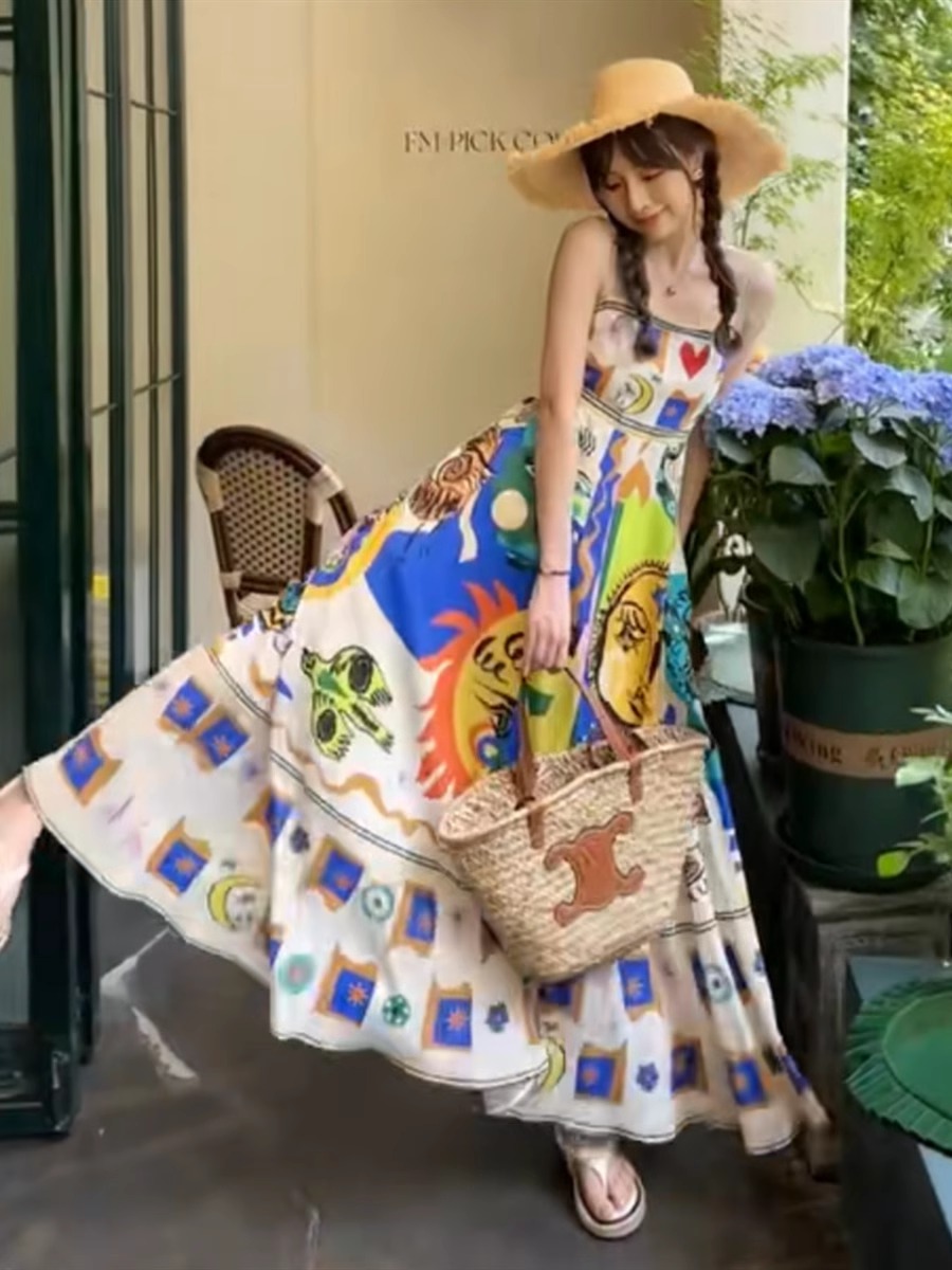 泰式海邊度假塗鴉印花吊帶連衣裙女小眾設計高級感沙灘長裙子夏季