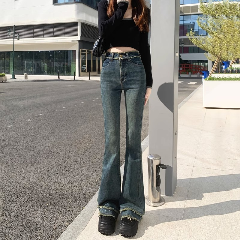 復古港風毛邊設計感微喇叭牛仔褲女春秋新款高腰修身顯瘦馬蹄褲子