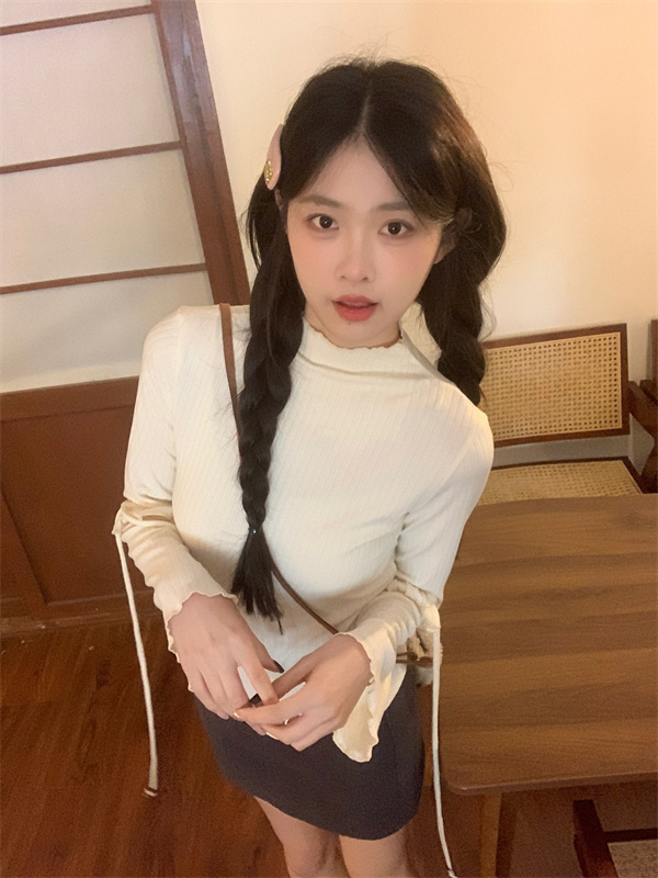 Actual shot of spring’s new sweet and versatile turtleneck butterfly strap slimming top
