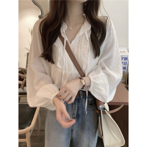 Actual shot of Korean-style temperament V-neck white long-sleeved top with straps and spliced ​​earring design loose shirt