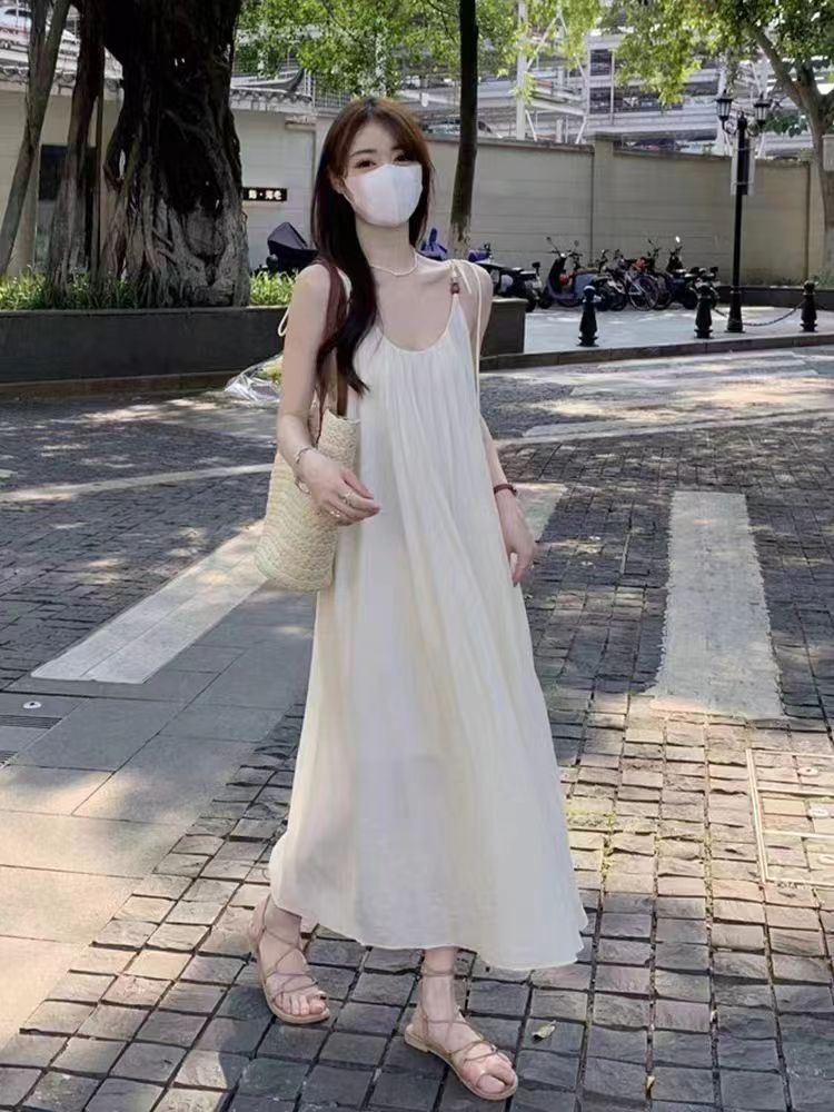 氣質度假風吊帶連衣裙女裝2024年新款高腰顯瘦夏季法式a字中長裙