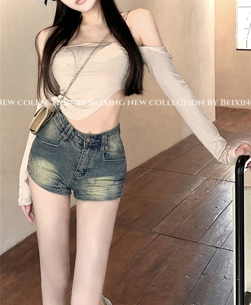 Real shot of hot girl American retro distressed denim shorts women's design high waist slimming hot pants