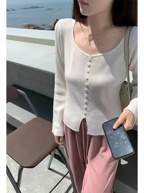 溫柔純色修身開叉短款針織衫早春新款氣質套頭圓領長袖內搭上衣女