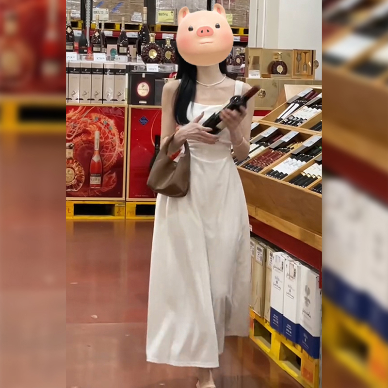 法式海邊度假氣質白色吊帶連衣裙子女夏季2024新款小個子掐腰長裙