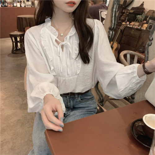 Actual shot of Korean-style temperament V-neck white long-sleeved top with straps and spliced ​​earring design loose shirt