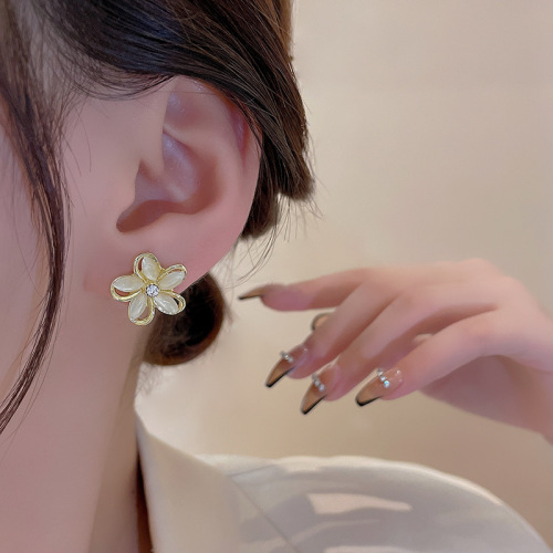 S925银针轻奢小众百搭气质猫眼石花朵耳钉韩国新款高级设计感耳