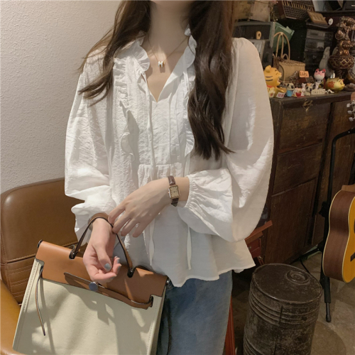 Actual shot of Korean-style temperament V-neck white long-sleeved top with straps and spliced ​​earring design loose shirt