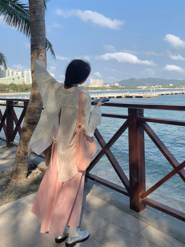 Actual shot of spring and summer Korean chic simple polka dot design with back slit sun protection shirt + pink skirt