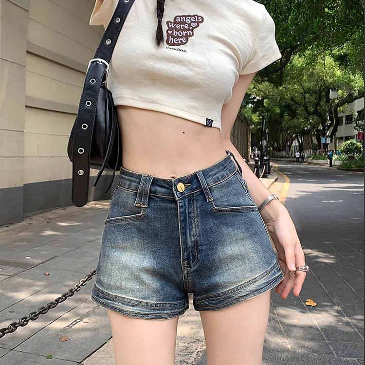 美式復古辣妹高腰設計顯瘦修身做舊A字熱牛仔褲