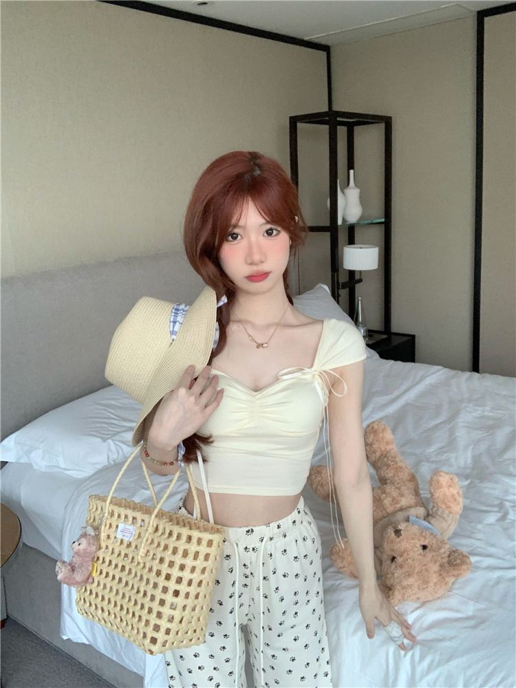 Real shot~Sugar girl's sweet two-color bow strap suspender top + printed walking pants suit