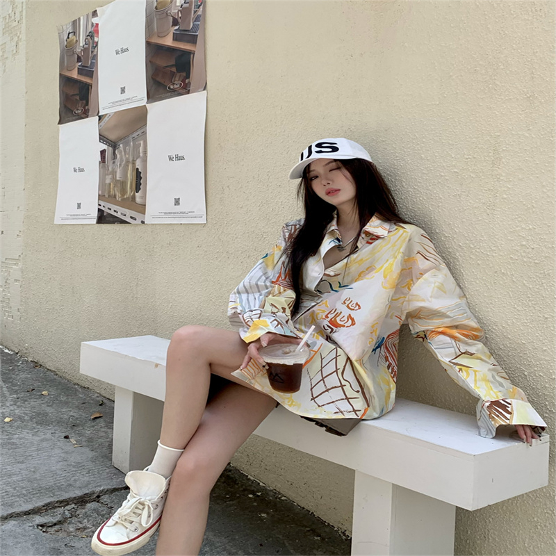 趣味塗鴉印花不規則長袖襯衫女早秋寬鬆休閒顯瘦別致上衣