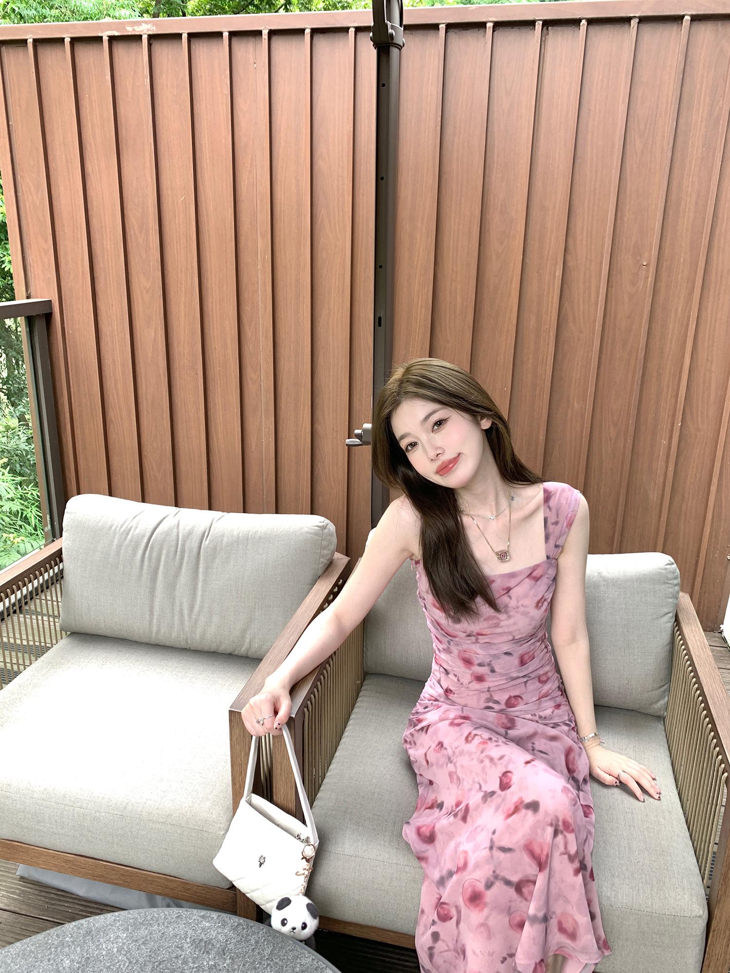 海邊度假粉色碎花吊帶連衣裙女2024夏季新款修身氣質絕美無袖長裙