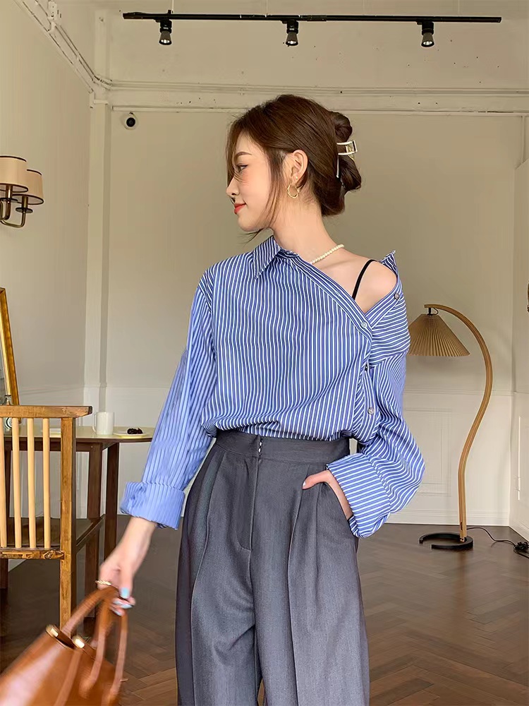春秋藍色條紋寬鬆襯衫女韓版設計感小眾斜排扣疊穿襯衣