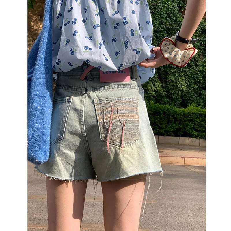 復古水洗牛仔短褲女夏季高腰口袋刺繡流蘇破洞a字設計感小眾褲子