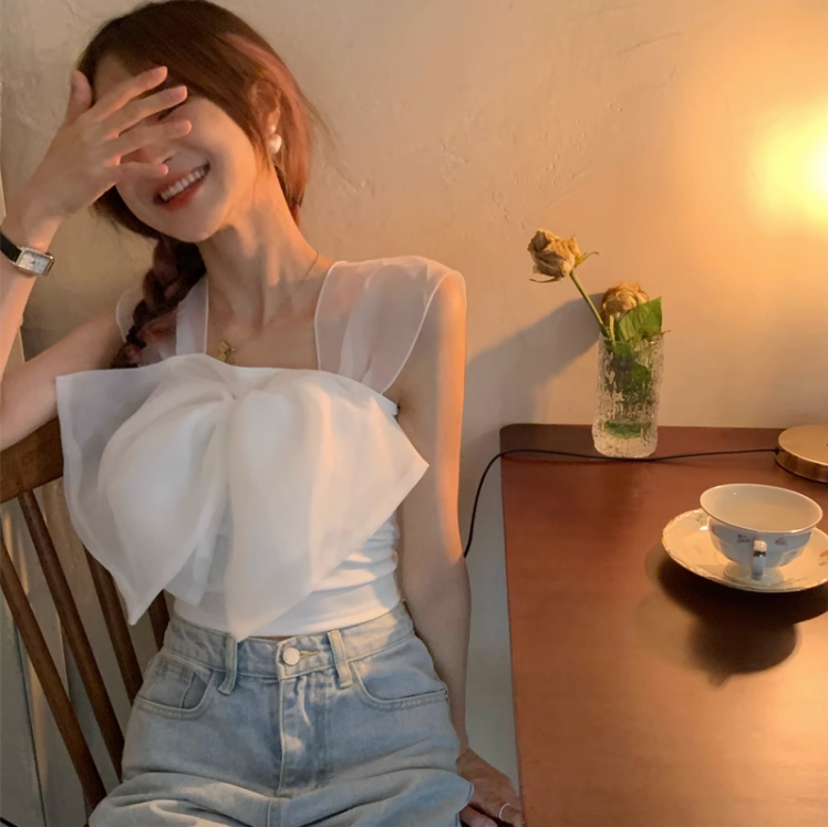 Real shot of sweet organza spliced ​​sleeveless top with big bow