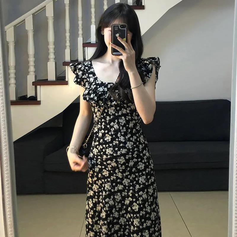 茶歇法式赫本風黑色碎花連衣裙子女夏季2024新款氣質收腰長裙高級