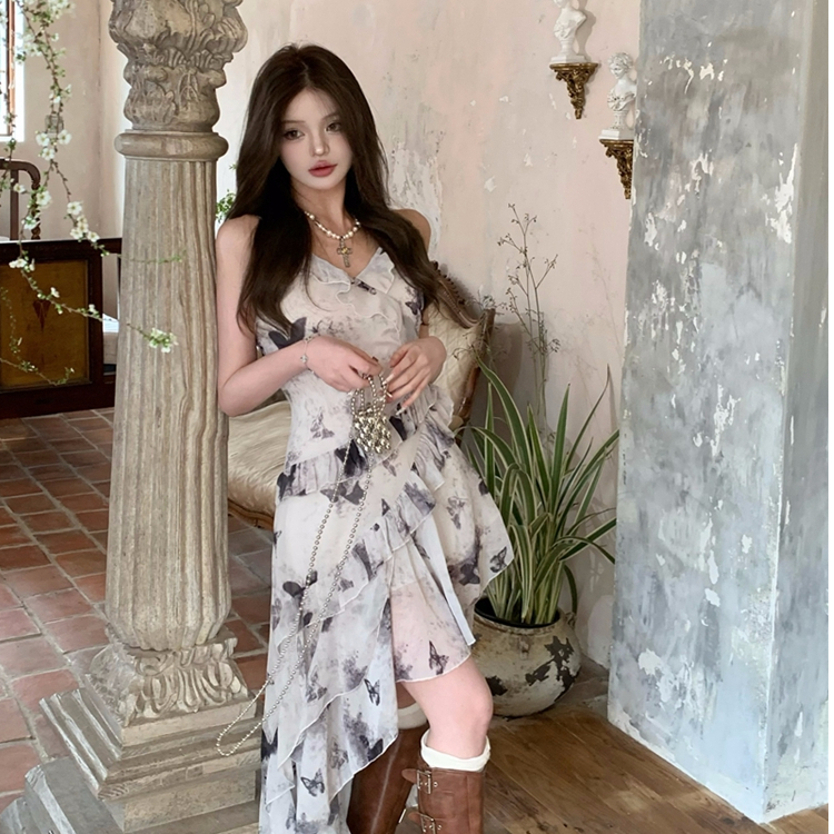 松本喪喪 蝴蝶裙碎花不規則吊帶裙2024早春連衣裙新款荷葉邊裙子