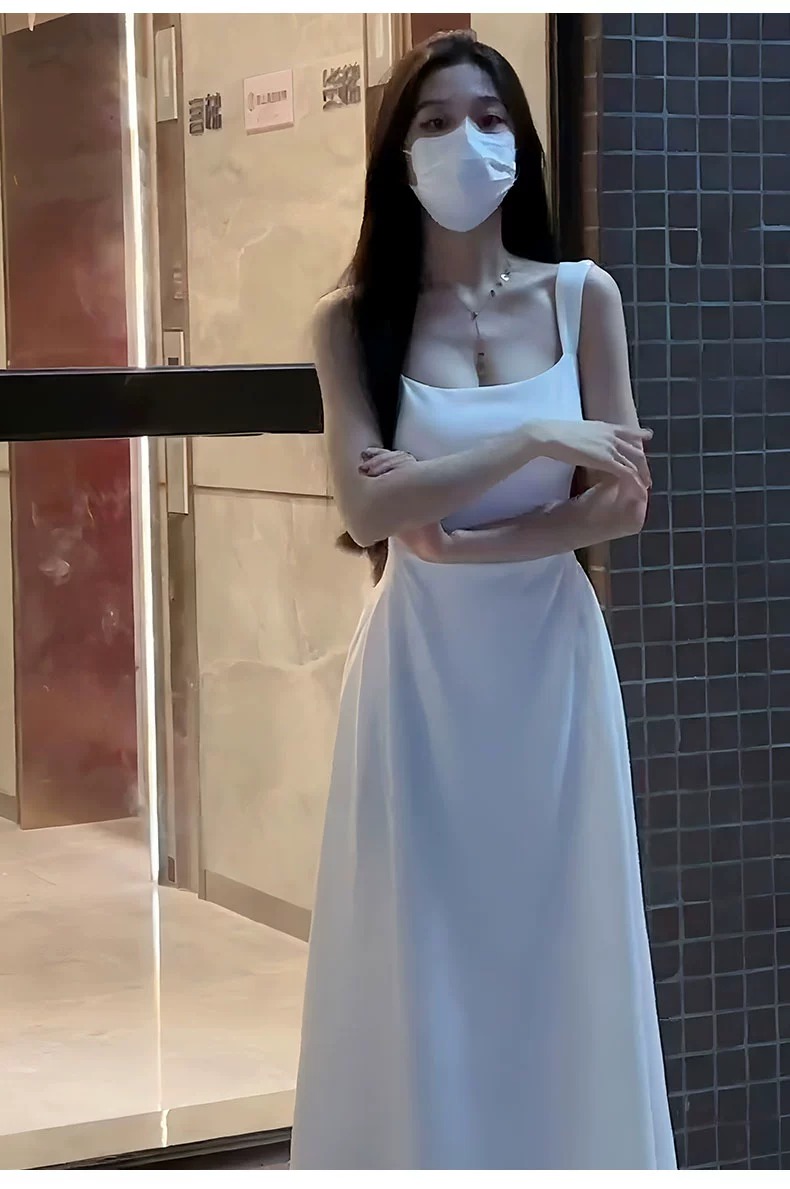 白色吊帶連衣裙子女2024夏季新款法式茶歇小個子初戀收腰a字長裙