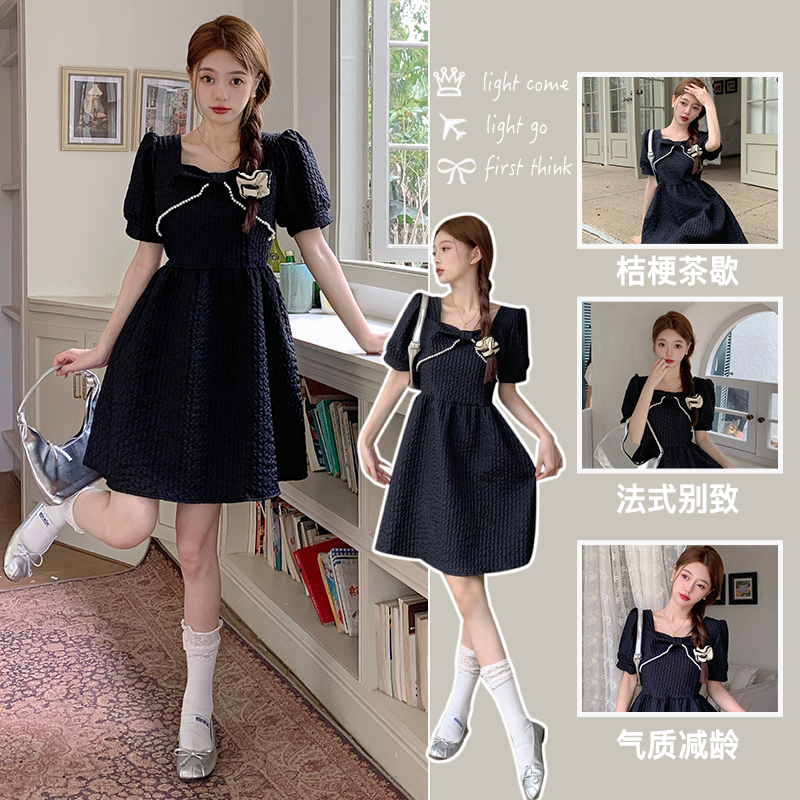 Real shot of pearl-edged custom-made bow-tie waist-slimming Hepburn style French dress for women