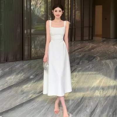 Slim-fitting style slimming white suspender dress 2024 new French waist girl niche long dress