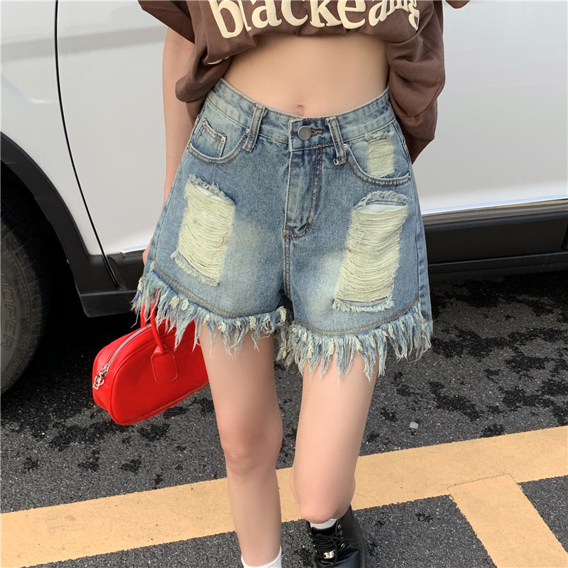 Actual shot of 2024 new summer high-waisted washed retro jeans for women with niche ripped raw edge shorts