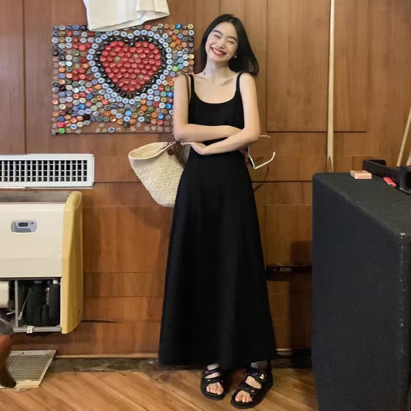 法式黑色吊帶連衣裙夏春夏新款設計感側邊插袋小個子穿搭長裙