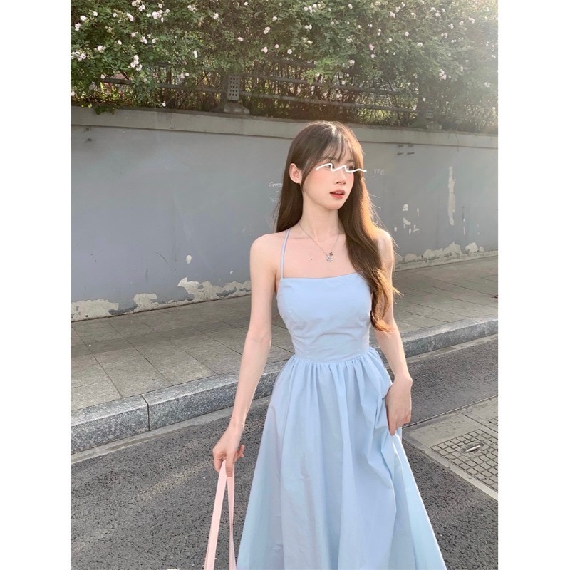 夏季2024新款純欲藍色吊帶連衣裙女收腰顯瘦氣質系帶露背a字長裙