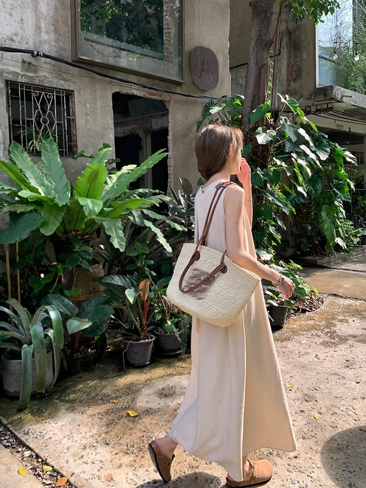 Summer elegant sleeveless cotton and linen outing dress for women with loose back and hollow design round neck long vest dress