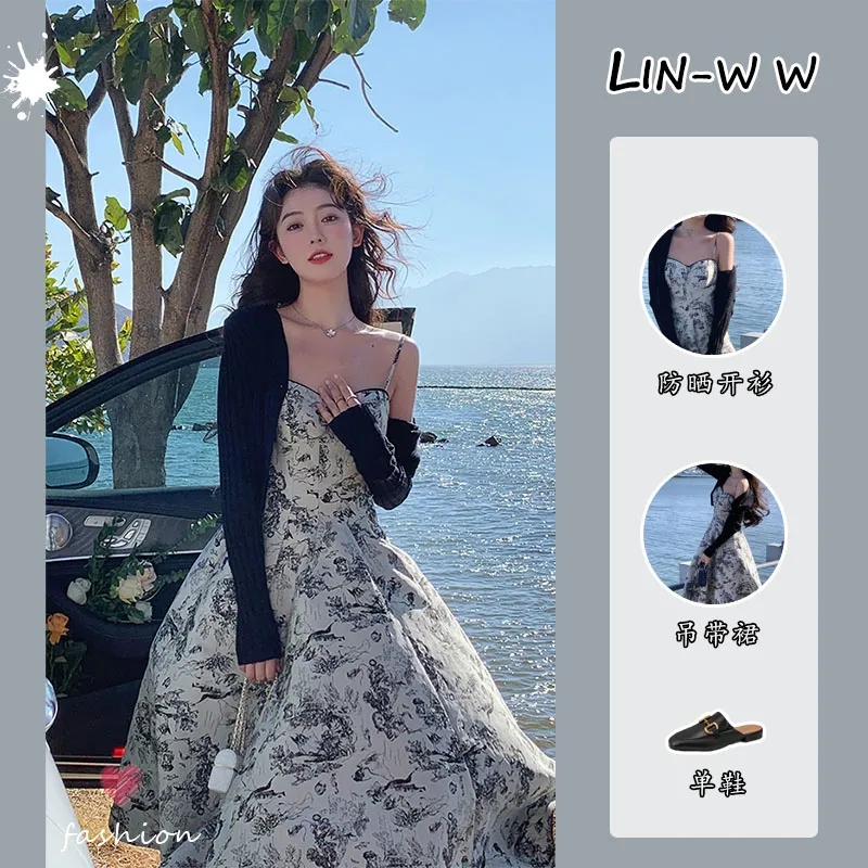 法式赫本風套裝女夏季新款設計感碎花吊帶連衣裙+防曬披肩兩件套