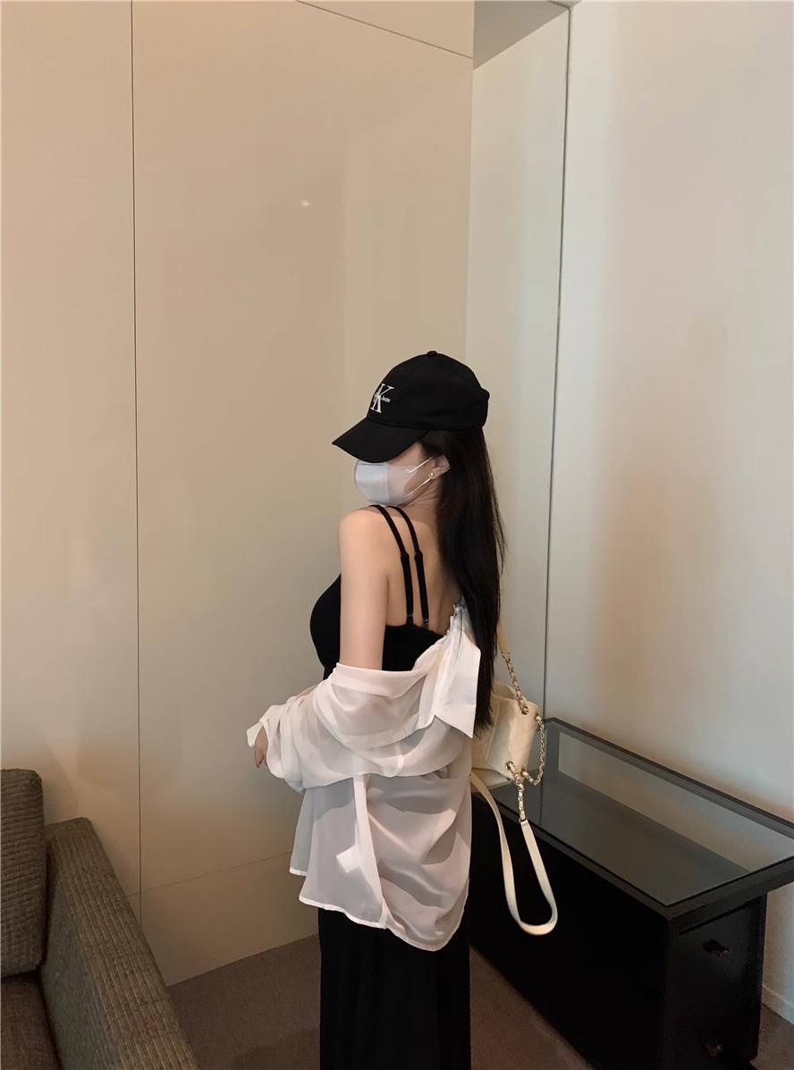 純欲風不規則無袖吊帶連衣裙女2024年夏季設計感褶皺中長裙子