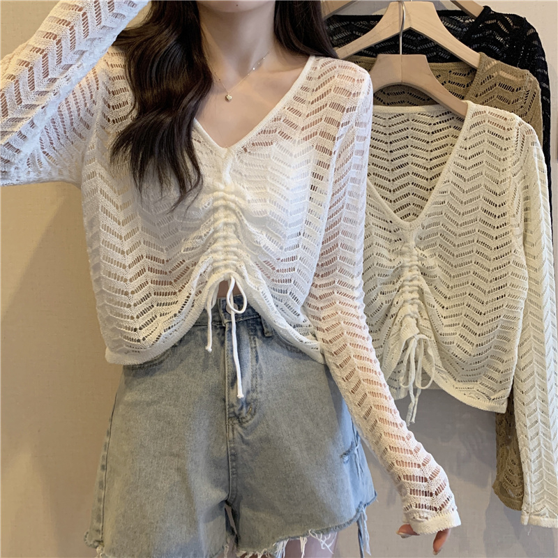 Design niche drawstring hollow sun protection blouse women's thin spring and summer loose short sweater crochet style top