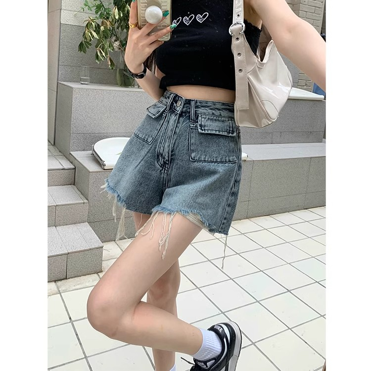 美式辣妹復古毛邊設計感牛仔褲女夏季新款高腰寬鬆顯瘦A字短褲子