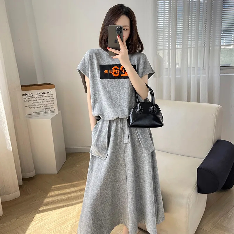 Extra large size 300 pounds fashionable loose thin two-piece women's summer short-sleeved top and skirt suit