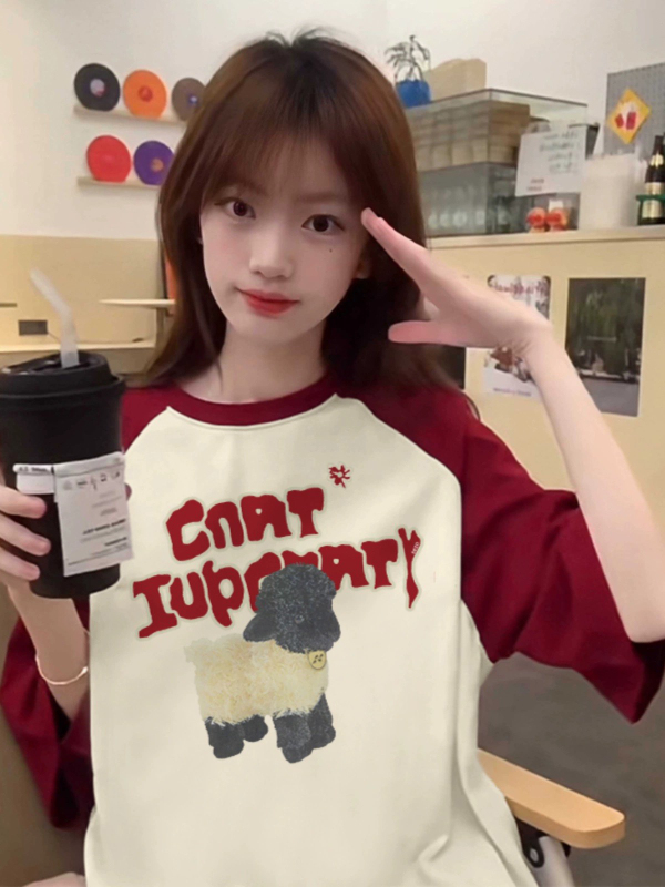 紅杏色插肩t恤女2024新款早春季拼色設計感小眾洋氣獨特别致上衣
