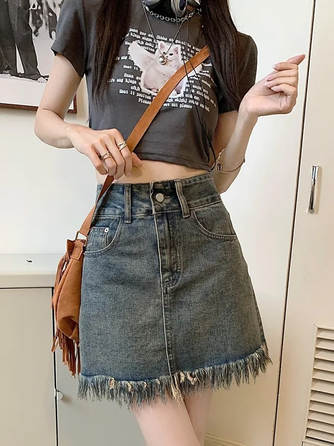 復古毛邊牛仔半身裙女夏季新款設計感高腰顯瘦流蘇A字包臀短裙子