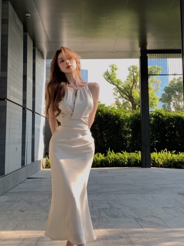 Real shot of white halterneck suspender dress for women summer satin fishtail high-end long skirt