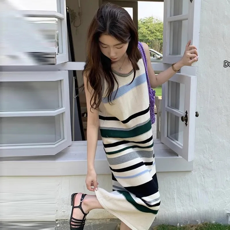 天貓品質條紋吊帶連衣裙女2024夏季新款設計感小眾直筒中長裙