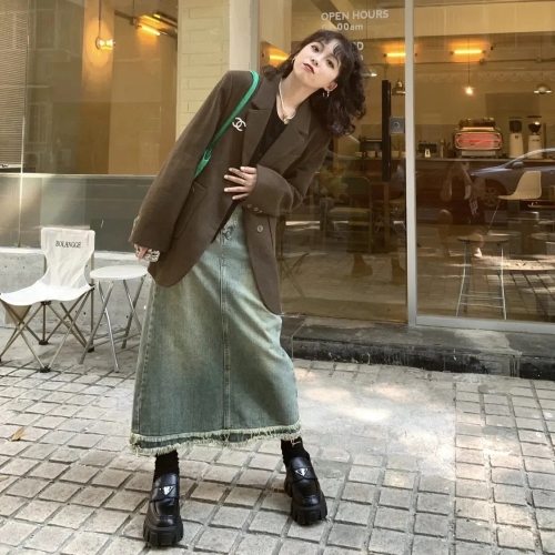 Designer denim skirt with large-sized frayed pockets, vintage water-washed blue high-waisted A-line maxi skirt for plus-size women