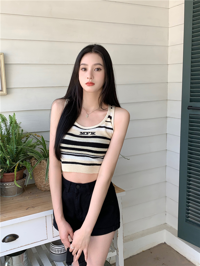 Actual shot of a slim-fitting striped knitted camisole for women to wear outside and inside with a short sleeveless top