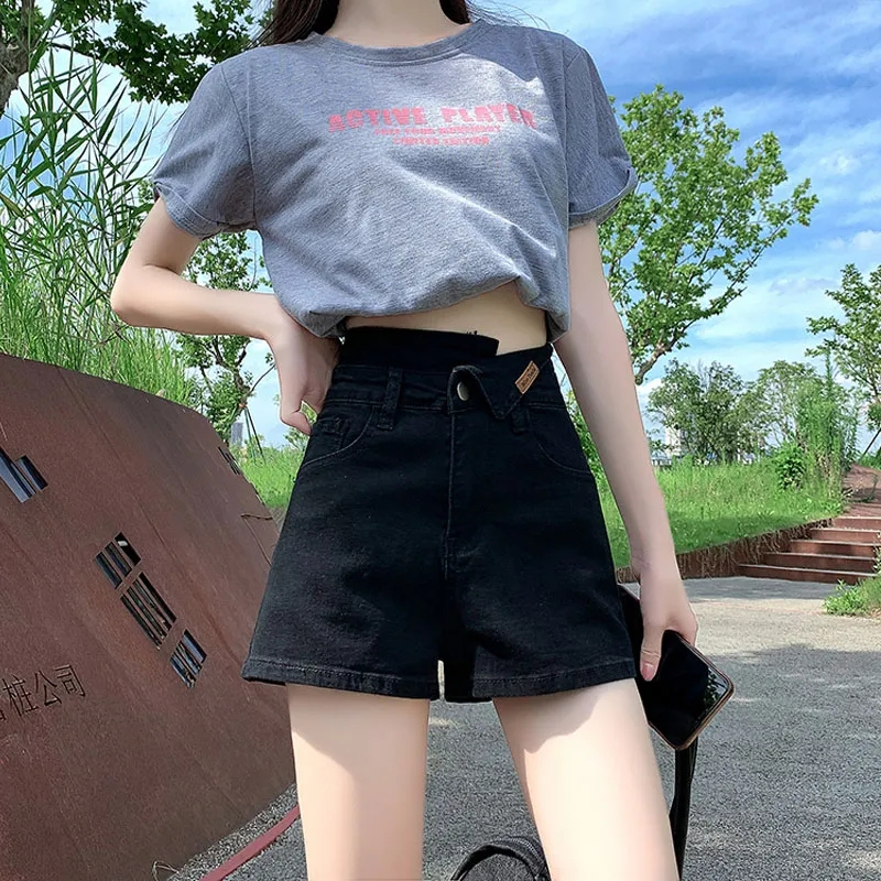 休閒設計感辣妹熱褲子2024韓版黑色彈力潮流百搭牛仔短褲女裝高腰