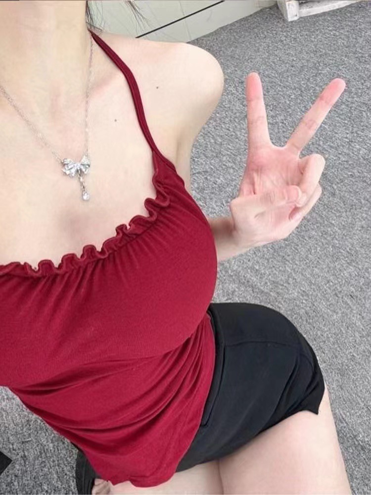 純欲性感木耳邊吊帶掛脖背心女早春新款不規則下擺帶胸墊內搭上衣