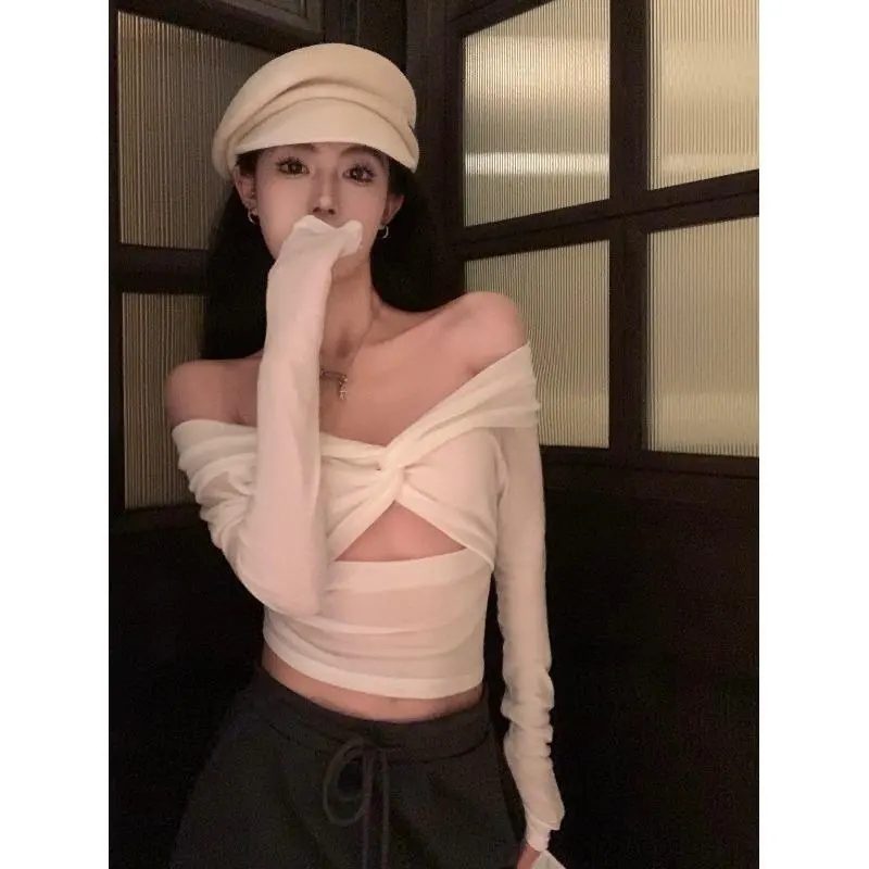 已出貨 純欲風一字肩鏤空長袖T恤女早春新款辣妹顯瘦百搭上衣女