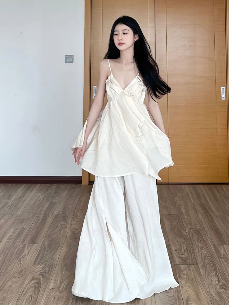2024夏季新款純欲風辣妹設計感小眾米白色不規則吊帶v領上衣女潮