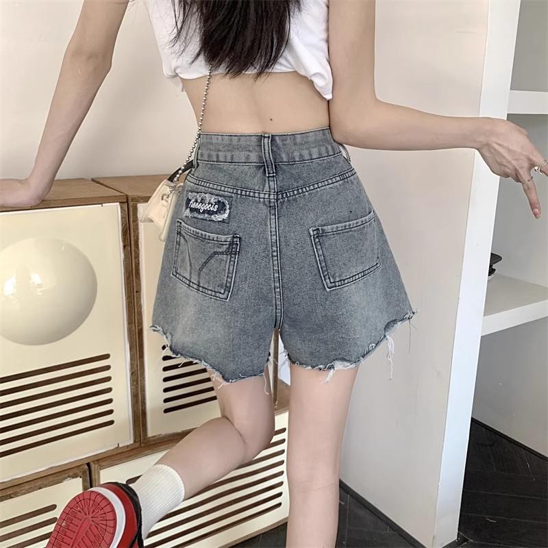 復古做舊毛邊牛仔短褲女夏季新款設計感辣妹高腰a字型闊腿熱褲子