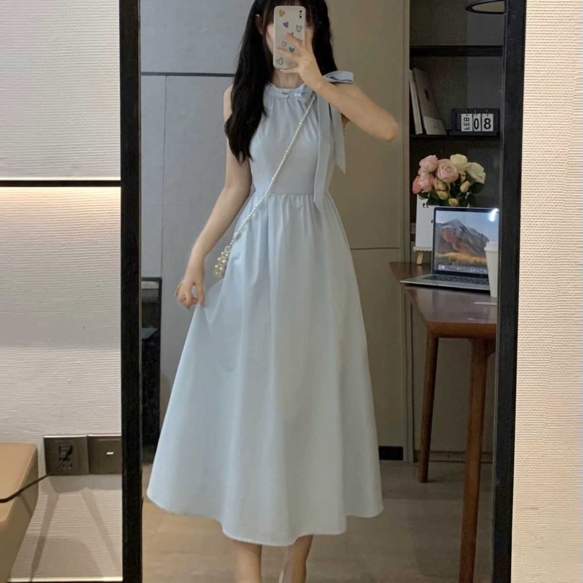 藍色法式掛脖吊帶連衣裙子女夏季2024新款海邊度假風無袖沙灘長裙