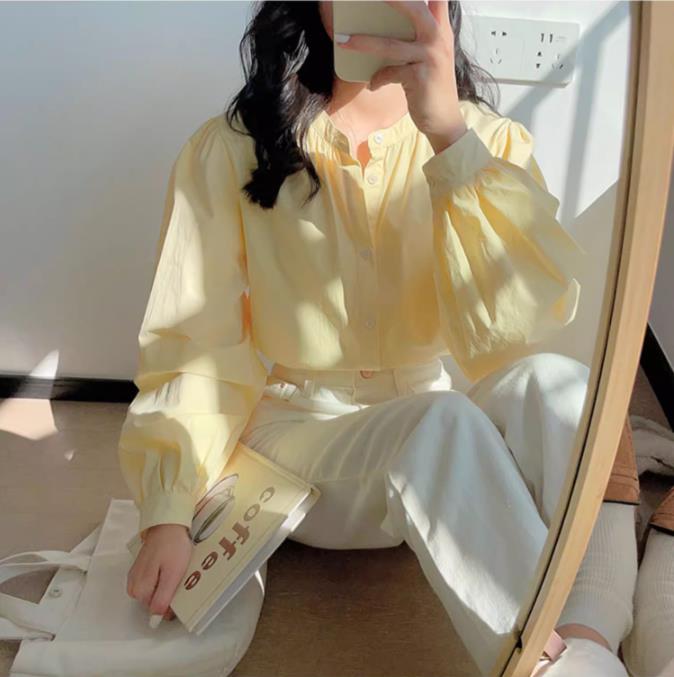 春秋奶黃色圓領長袖襯衣女早春季法式別致獨特設計感小眾襯衫上衣