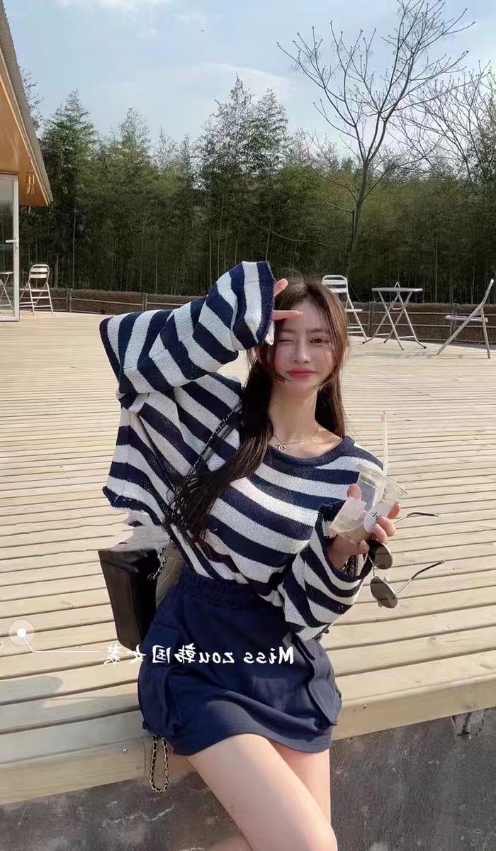 韓國東大門設計感交叉條紋針織衫女薄款寬鬆顯瘦露背防曬衫上衣