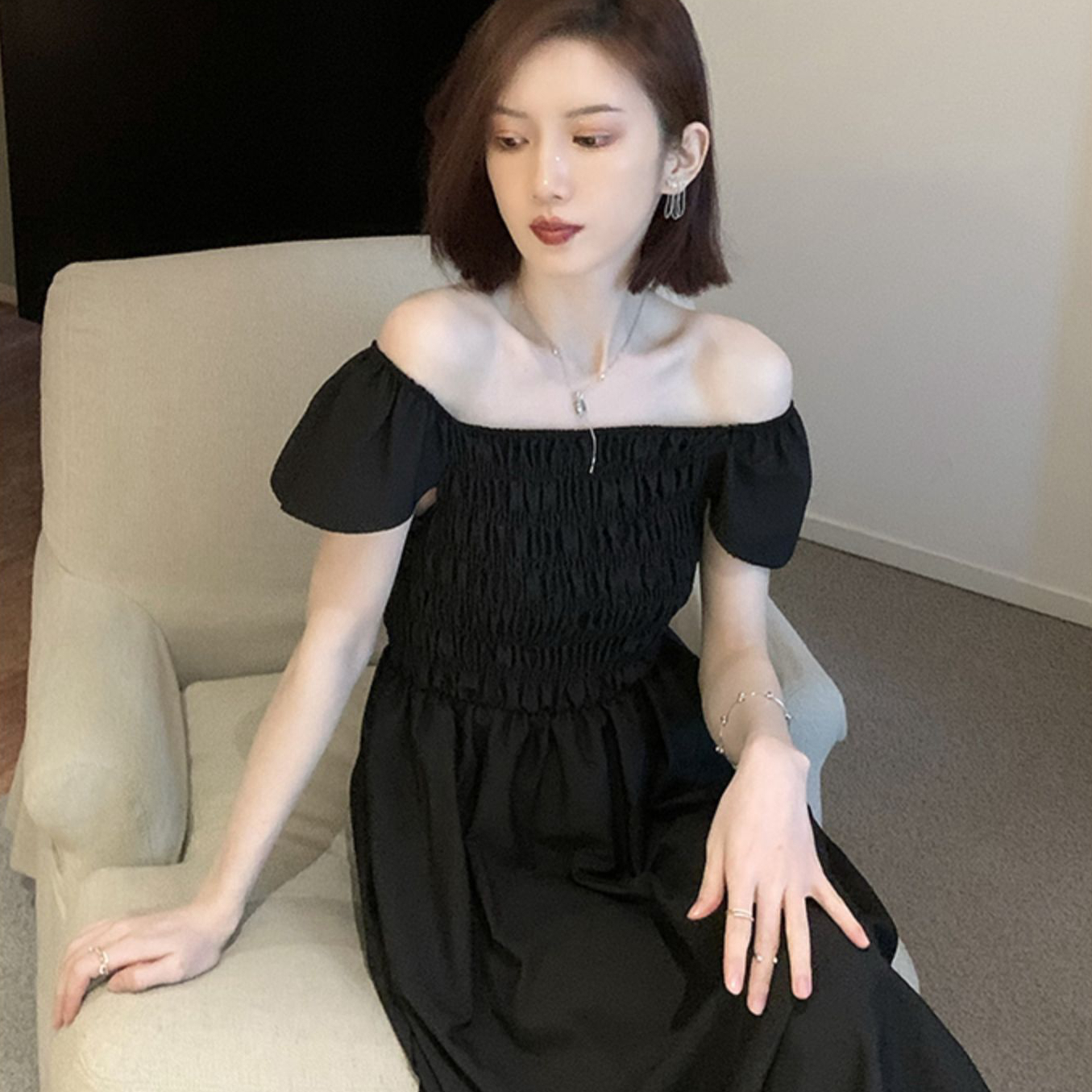 海邊度假風黑色連衣裙2024新款法式收腰中長款飛飛袖夏季女裝裙子