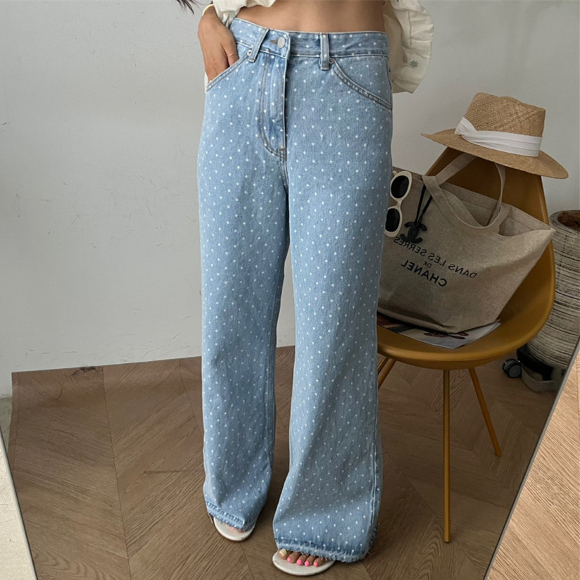 Slightly flared high-waisted polka-dot washed light blue jeans